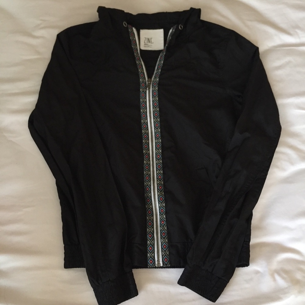 black windbreaker